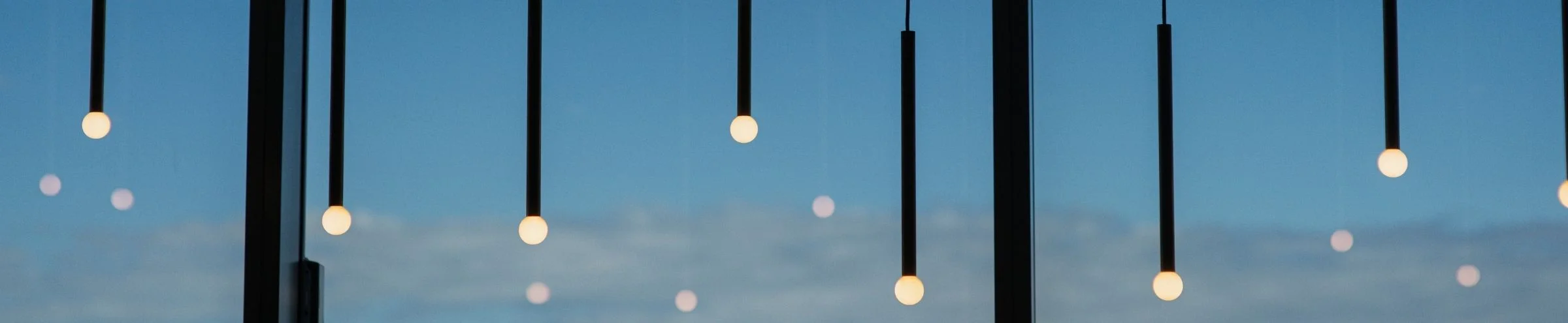 Pendants against sky